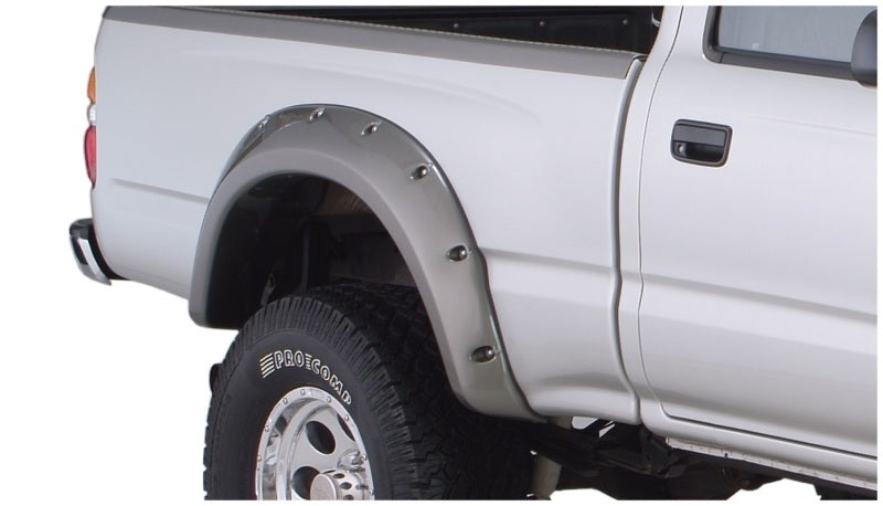 Bushwacker 95-04 Toyota Tacoma Fleetside Cutout Style Flares 4pc 74.5in Bed w/ 4WD Only - Black -  Shop now at Performance Car Parts