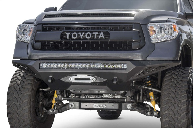 Addictive Desert Designs 2014+ Toyota Tundra Stealth Fighter Front Bumper w/Winch Mount & Sensors -  Shop now at Performance Car Parts