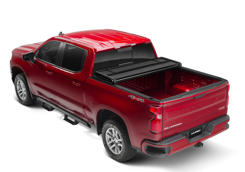 Lund 04-14 Chevy Colorado Styleside (5ft. Bed) Hard Fold Tonneau Cover - Black -  Shop now at Performance Car Parts