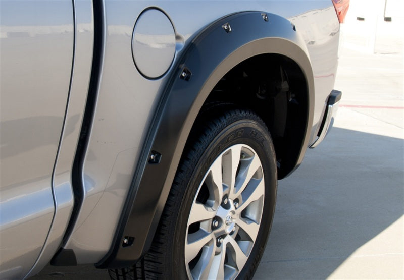 Lund 07-13 Toyota Tundra RX-Rivet Style Textured Elite Series Fender Flares - Black (4 Pc.) -  Shop now at Performance Car Parts