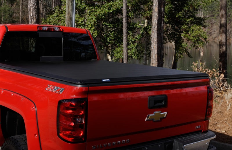 Lund 99-17 Ford F-250 Super Duty Styleside (6.8ft. Bed) Hard Fold Tonneau Cover - Black -  Shop now at Performance Car Parts