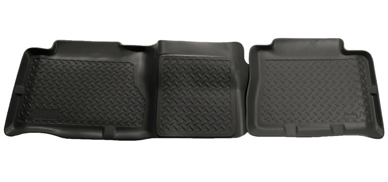 Husky Liners 02-06 Cadillac Escalade/GMC Yukon/Denali Classic Style 2nd Row Black Floor Liners -  Shop now at Performance Car Parts