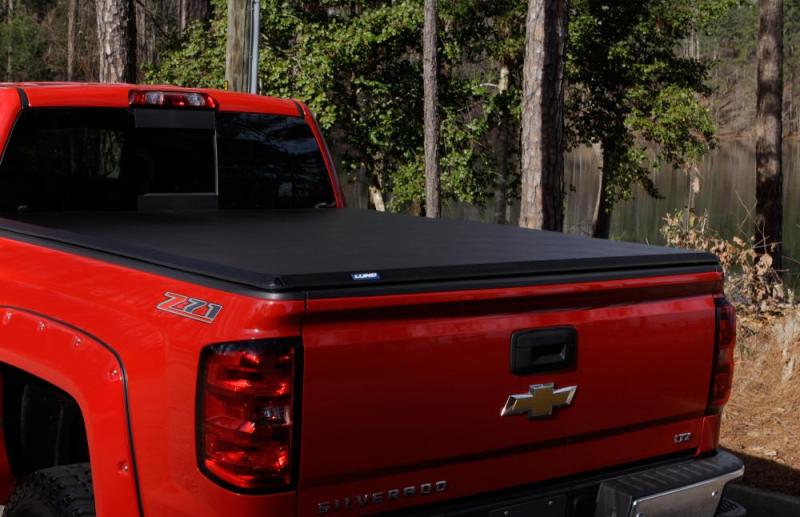 Lund 05-17 Nissan Frontier Styleside (5ft. Bed) Hard Fold Tonneau Cover - Black -  Shop now at Performance Car Parts