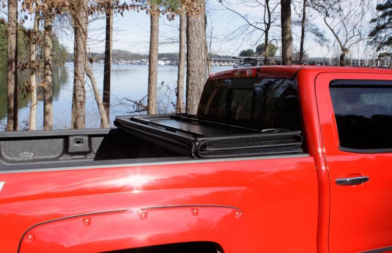 Lund 15-17 Chevy Colorado Fleetside (5ft. Bed) Hard Fold Tonneau Cover - Black -  Shop now at Performance Car Parts
