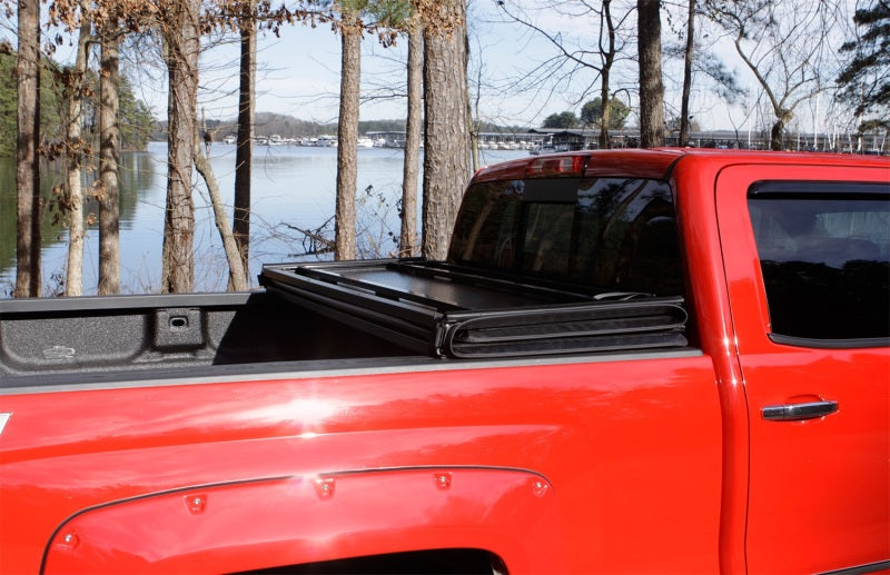 Lund 14-17 Toyota Tundra Fleetside (5.5ft. Bed) Hard Fold Tonneau Cover - Black -  Shop now at Performance Car Parts