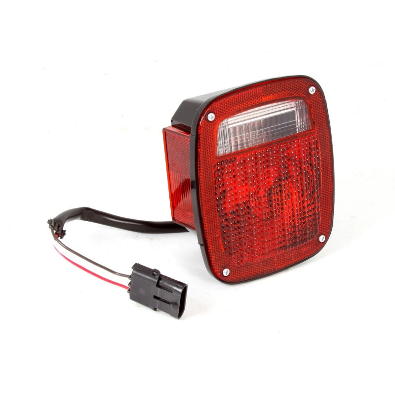 Omix Tail Light LH 98-06 Jeep Wrangler TJ -  Shop now at Performance Car Parts