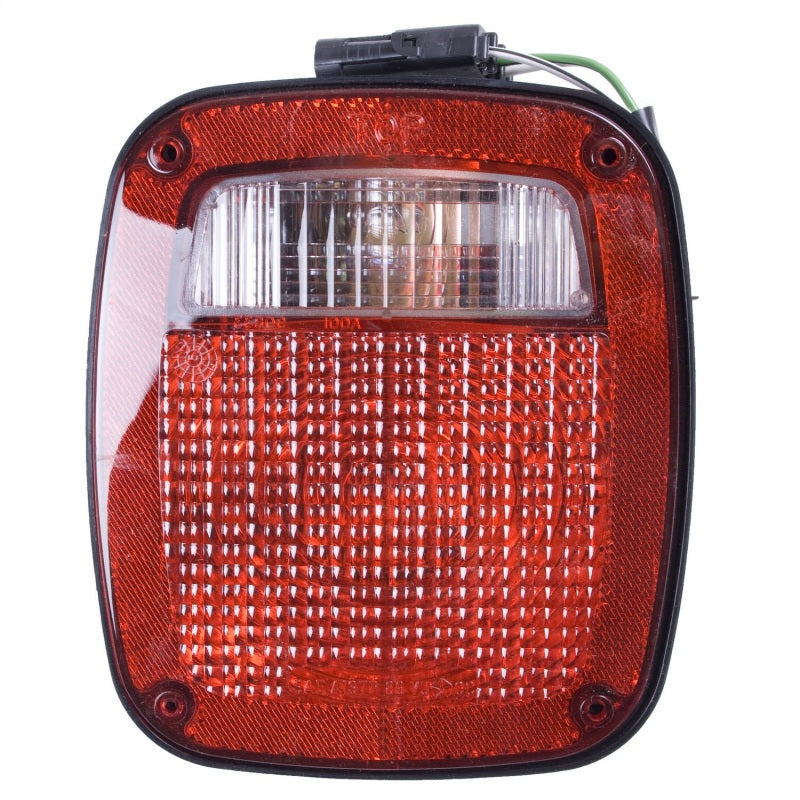Omix Left Black Tail Lamp 91-97 Jeep YJ TJ Wrangler -  Shop now at Performance Car Parts