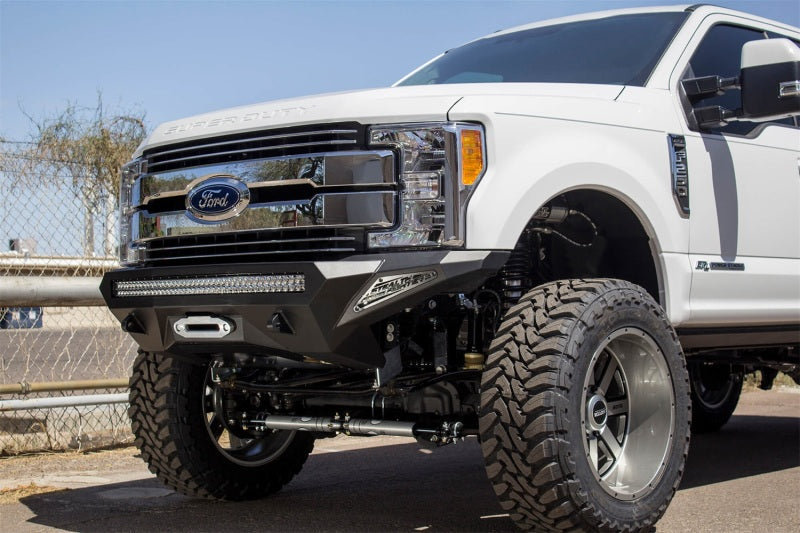 Addictive Desert Designs 17-18 Ford F-250 Super Duty Stealth Fighter Front Bumper w/ Winch Mounts -  Shop now at Performance Car Parts