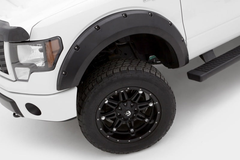 Lund 09-14 Ford F-150 (Excl Raptor) RX-Rivet Style Smooth Elite Series Fender Flares - Black (4 Pc.) -  Shop now at Performance Car Parts