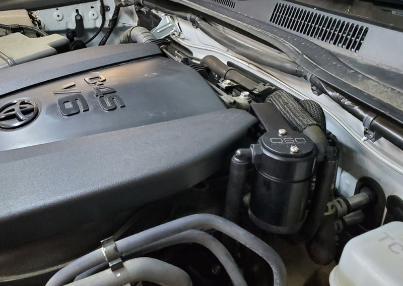 J&L 16-23 Toyota Tacoma 3.5L Driver Side Oil Separator 3.0 - Black Anodized -  Shop now at Performance Car Parts