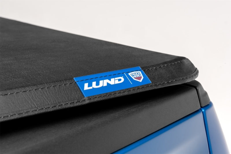Lund 16-23 Nissan Titan (5.5ft. Bed w/o Titan Box) Genesis Tri-Fold Tonneau Cover - Black -  Shop now at Performance Car Parts