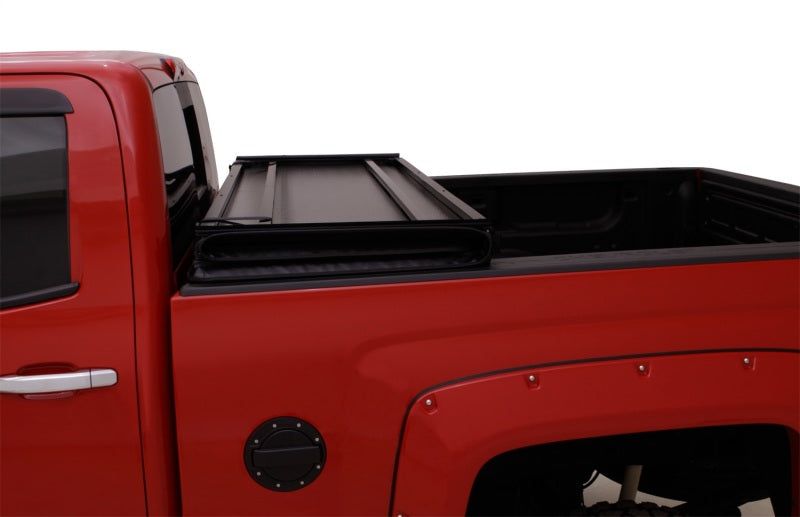 Lund 05-17 Nissan Frontier Styleside (5ft. Bed) Hard Fold Tonneau Cover - Black -  Shop now at Performance Car Parts