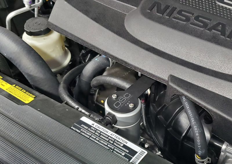 J&amp;L 16-24 Nissan Titan 5.6L Passenger Side Oil Separator 3.0 - Clear Anodized -  Shop now at Performance Car Parts