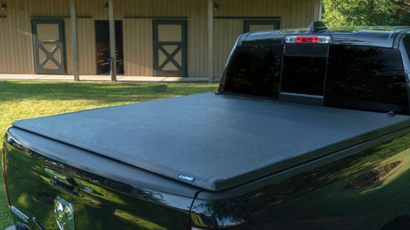 Lund 99-17 Ford F-250 Super Duty (8ft. Bed) Genesis Tri-Fold Tonneau Cover - Black -  Shop now at Performance Car Parts