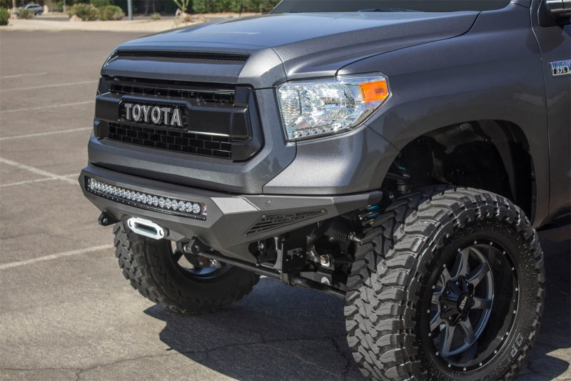 Addictive Desert Designs 2014+ Toyota Tundra Stealth Fighter Front Bumper w/Winch Mount & Sensors -  Shop now at Performance Car Parts