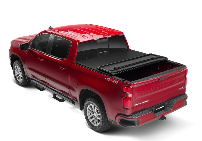 Lund 15-17 Chevy Colorado Fleetside (5ft. Bed) Hard Fold Tonneau Cover - Black -  Shop now at Performance Car Parts