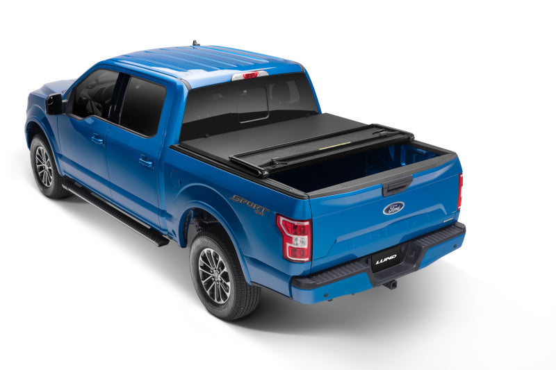 Lund 15-18 Ford F-150 Styleside (5.5ft. Bed) Hard Fold Tonneau Cover - Black -  Shop now at Performance Car Parts