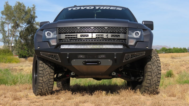 Addictive Desert Designs 10-14 Ford F-150 Raptor HoneyBadger Front Bumper w/ Winch Mount -  Shop now at Performance Car Parts